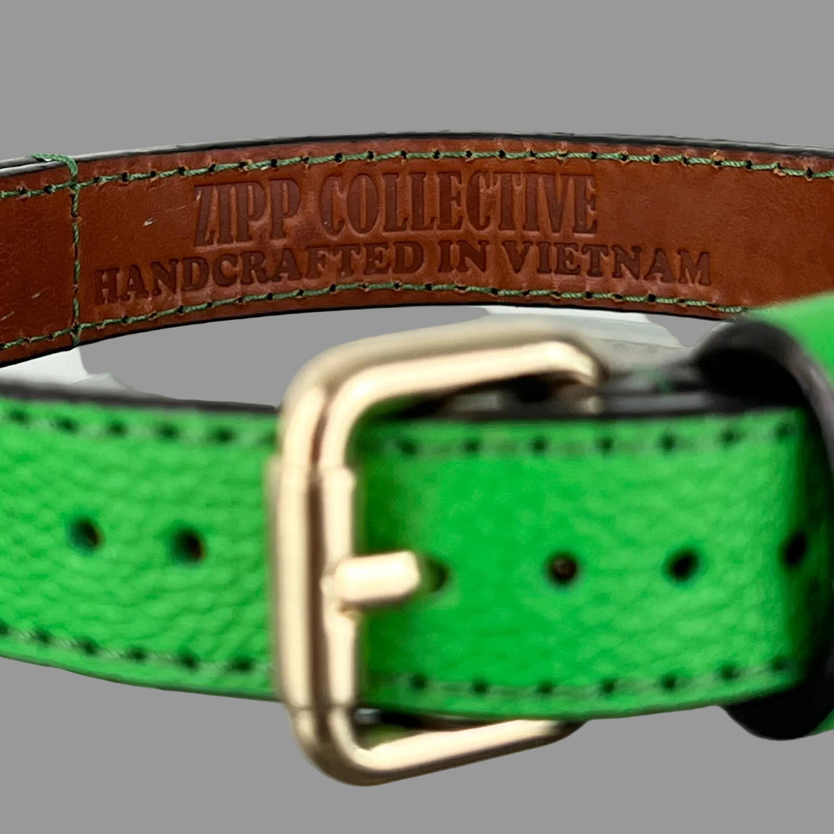 ZIPP COLLECTIVE handcrafted in Vietnam leather collar stamp