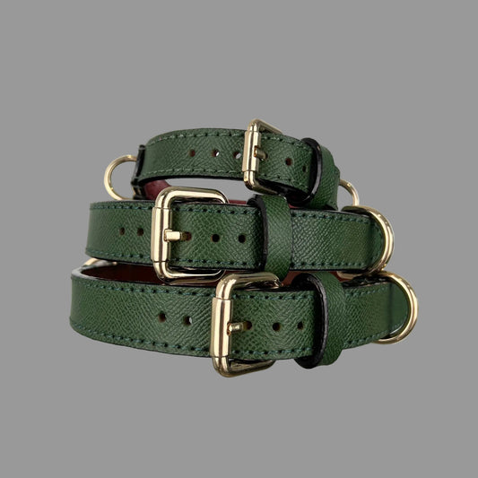 M, L and XL forest green dog collars with gold-tone buckles, matching leather keepers and dark edges.