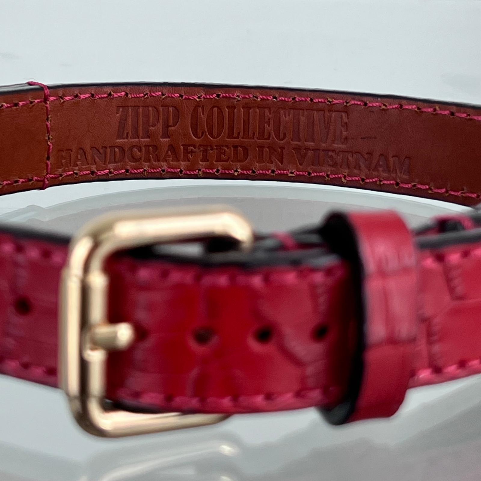 ZIPP COLLECTIVE branding stamped inside the handmade leather dog collar