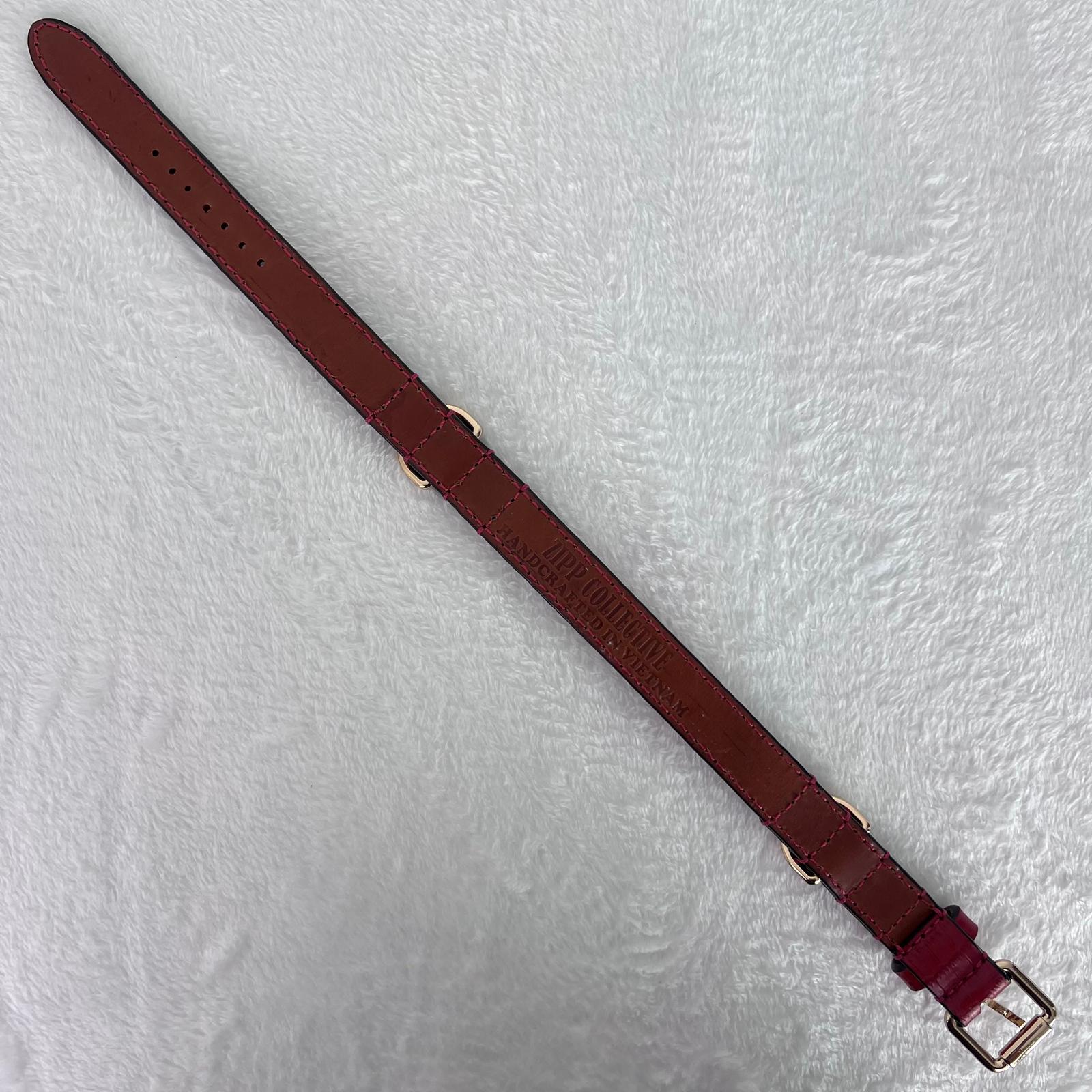Genuine leather lining and handcrafted construction of ruby red dog collar